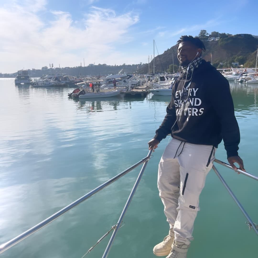 Alexander May on a yatch at the port